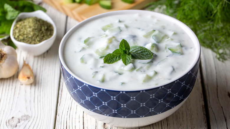 Tzatziki sauce in blue bowl