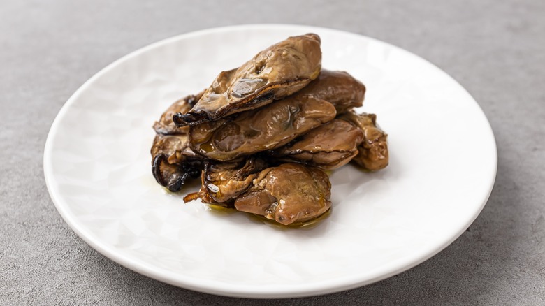 Plate of juicy smoked oysters