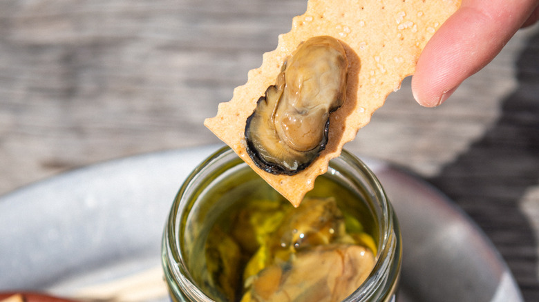 Smoked oyster on cracker