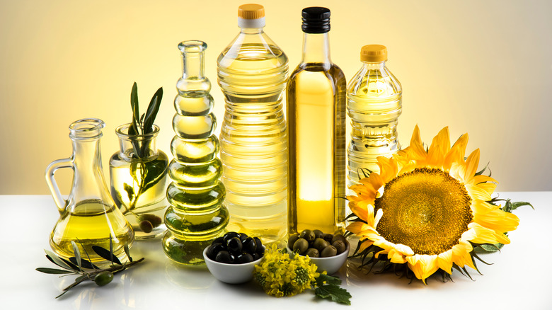 Various cooking oils in bottles arranged together