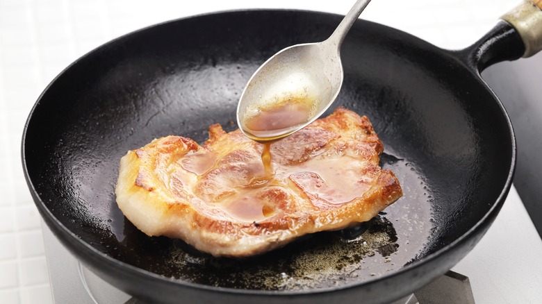 butter spooned over pork