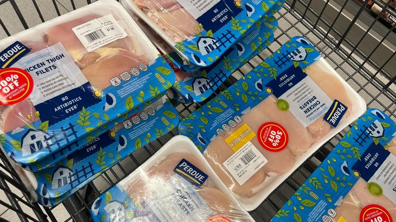 Aldi chicken thigh filets packets in shopping cart