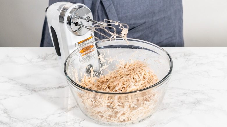 hand mixer bowl shredded meat