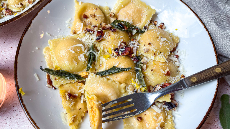 ravioli on plate with garnishes