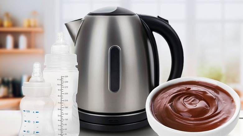 An electric kettle with baby bottles and melted chocolate