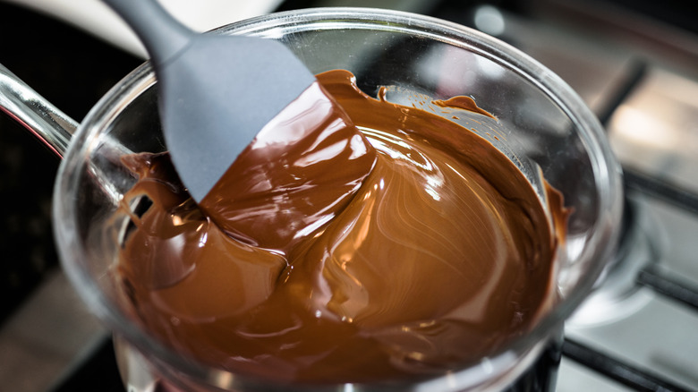 Melted chocolate in a bowl with spatula