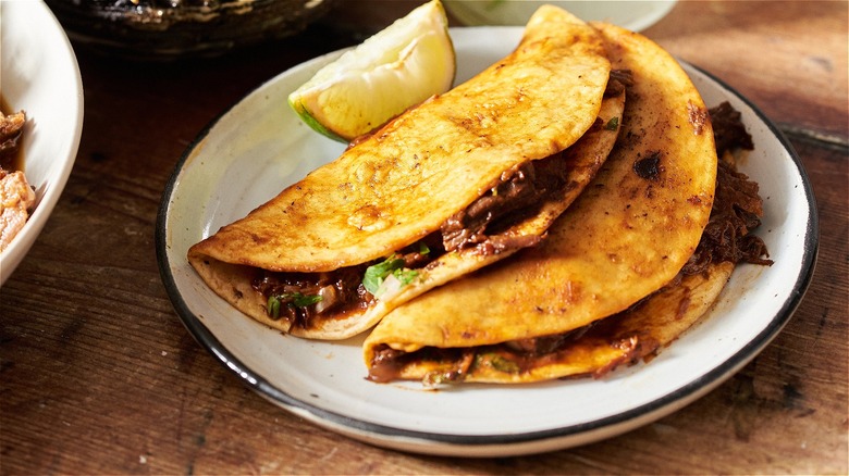 Birria tacos on plate