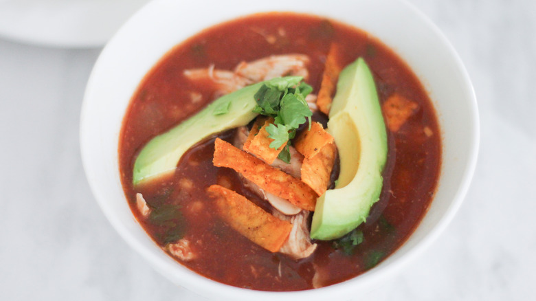 Chicken tortilla soup with avocado