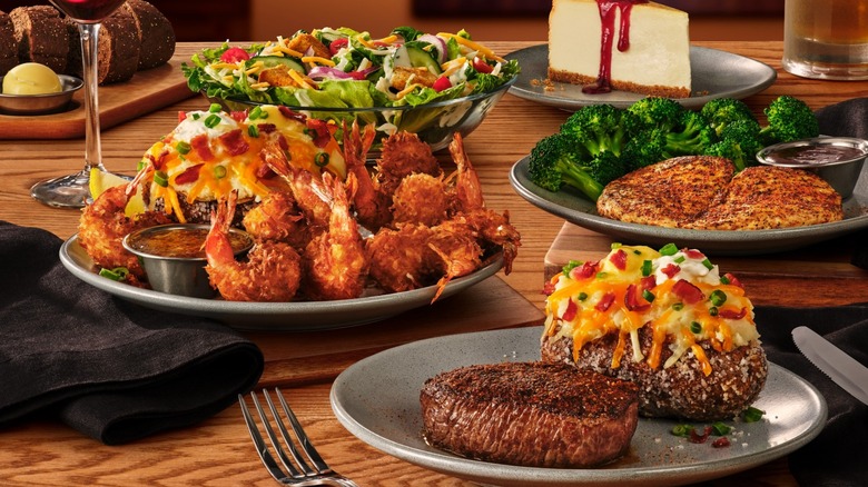 steak, entrees, salad, and dessert from Outback Steakhouse