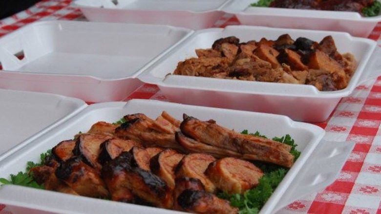 barbecued meat samples in styrofoam clamshell containers