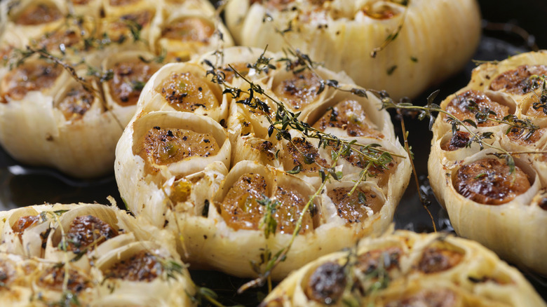 Roasted garlic cloves in pan 