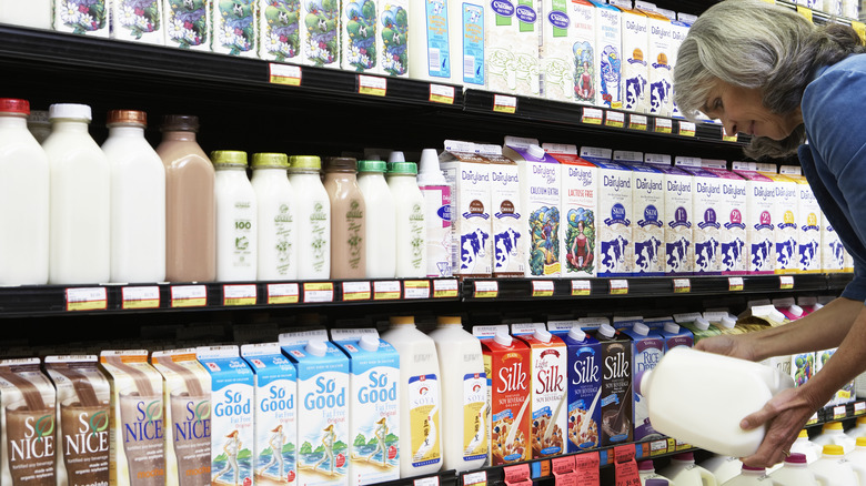 woman selecting milk