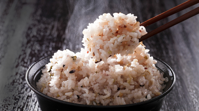 bowl of rice chopsticks