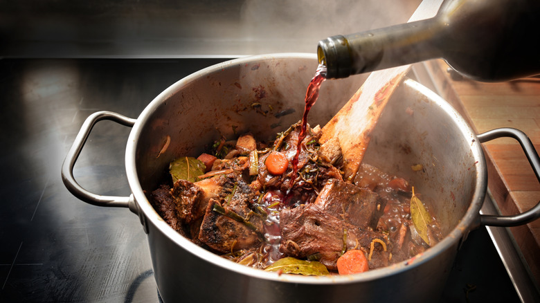 Deglazing pan with red wine