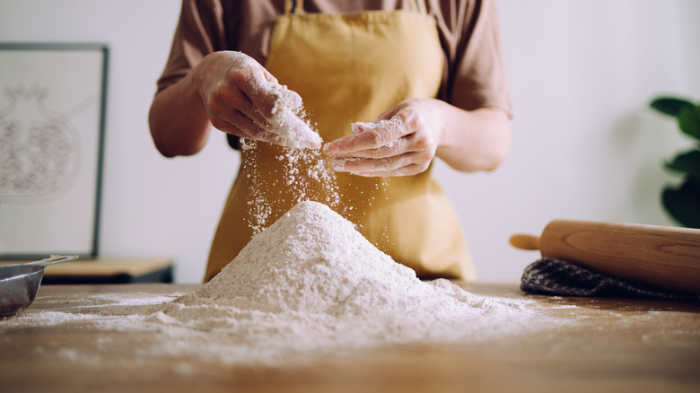 Flour dusted onto table