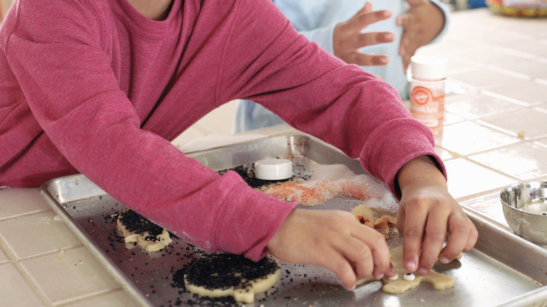 Decorating cookies.