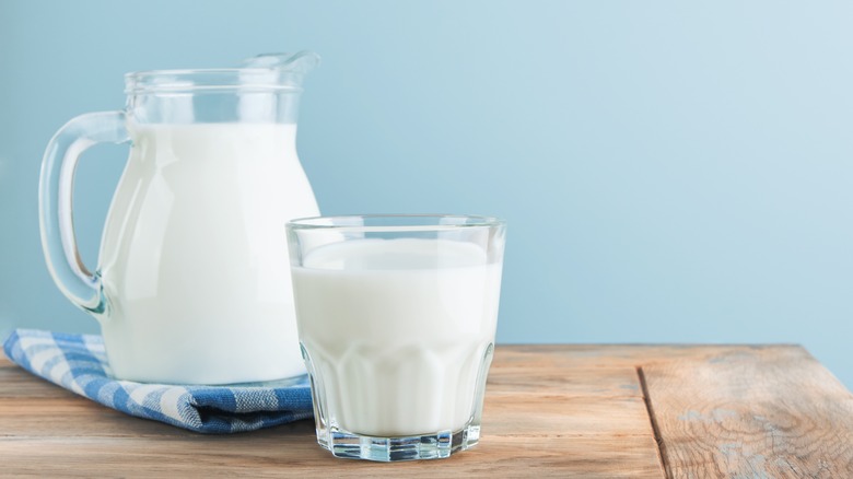 Milk in glass and pitcher