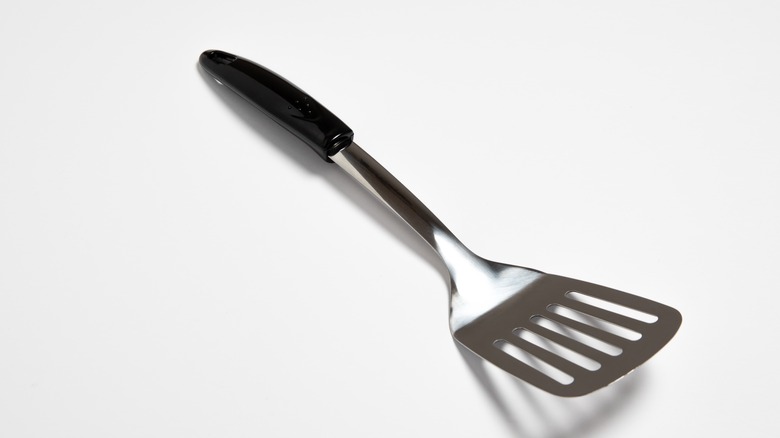 metal spatural on white