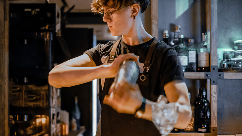 bartender shaking cocktail