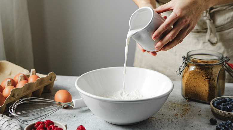 Pouring milk in bowl