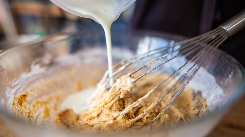 Adding coconut milk to batter