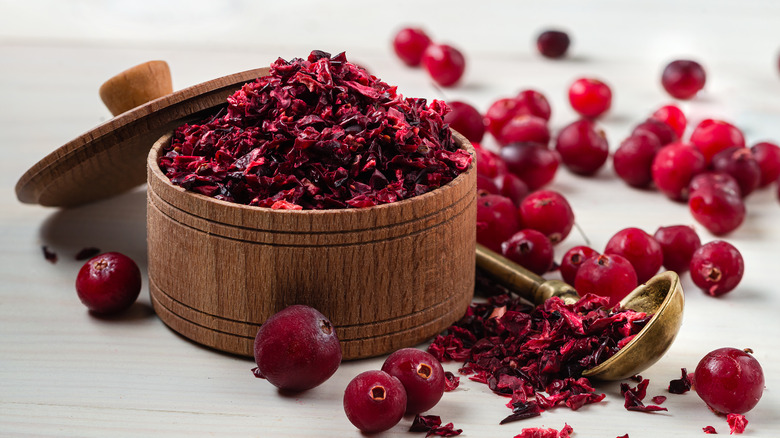 Dried cranberries in wooden bowl