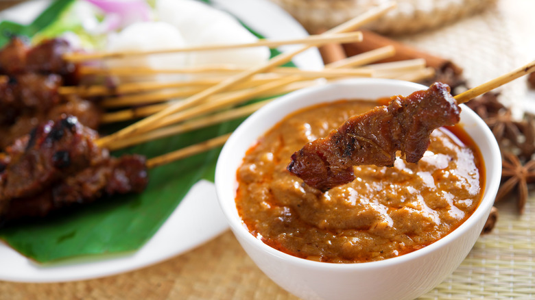 skewered meat with peanut sauce
