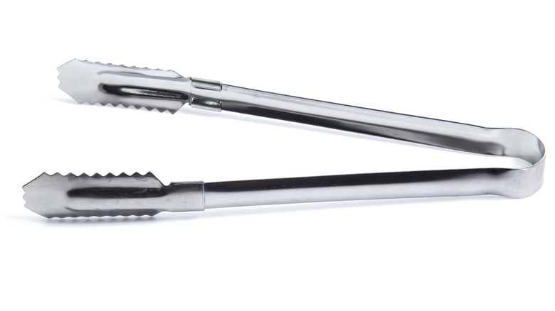 A pair of serving tongs