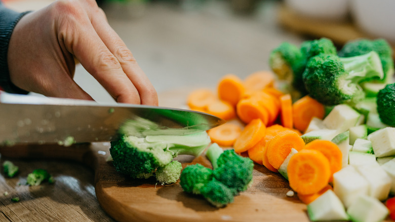 Knife chopping vegetables