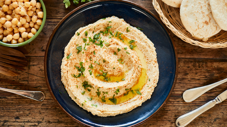 Hummus in blue bowl