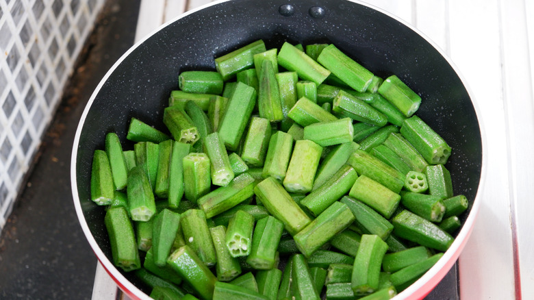 Okra cooking in a frying pan