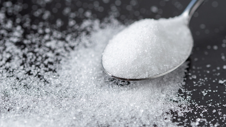 White sugar on spoon