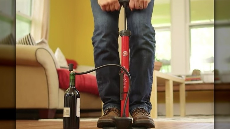 bike pump opening wine bottle