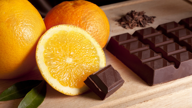 oranges chocolate pieces wood