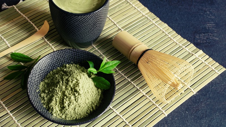 Matcha powder and whisk