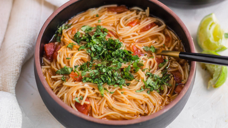 Bowl of fideo soup topped with cilantro