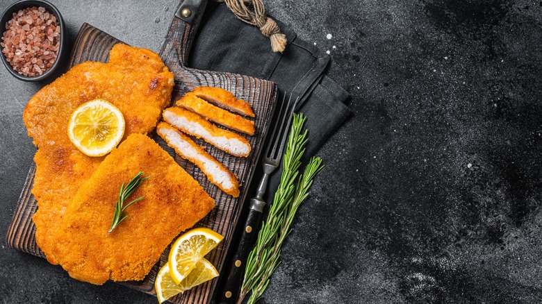 breaded schnitzel on plank