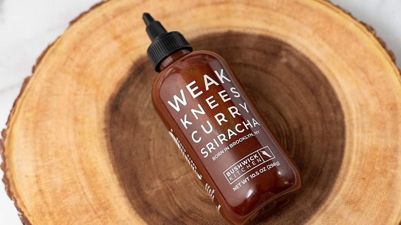 Weak Knees Curry Sriracha in wooden bowl