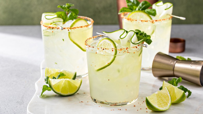 Three glasses of cucumber margaritas