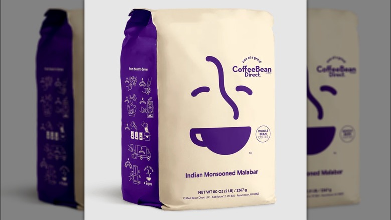 white and purple bag of Indian Monsooned Malabar from Coffee Bean Direct on white background