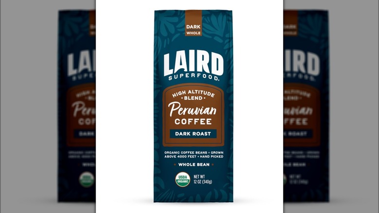 blue bag of Peruvian dark roast from Laird Superfood on white background