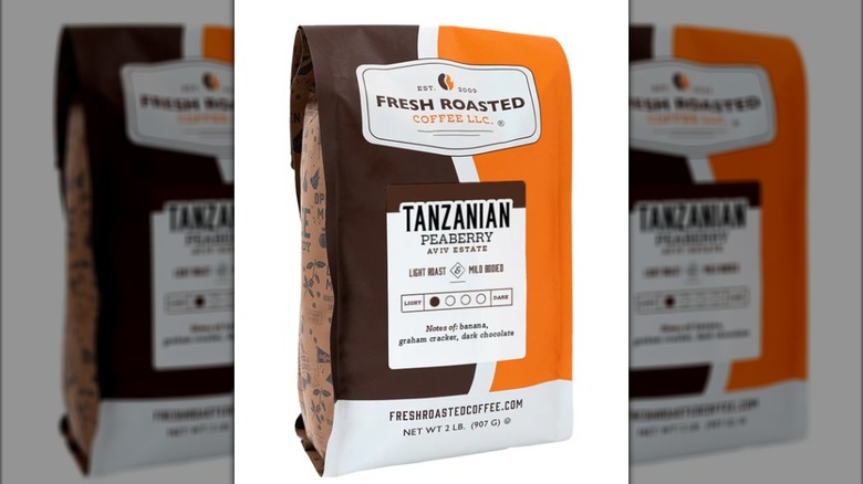 orange and brown bag of Tanzanian Peaberry coffee from Fresh Roasted Coffee on white background