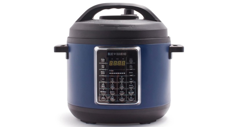 A Blue Diamond pressure cooker on white background