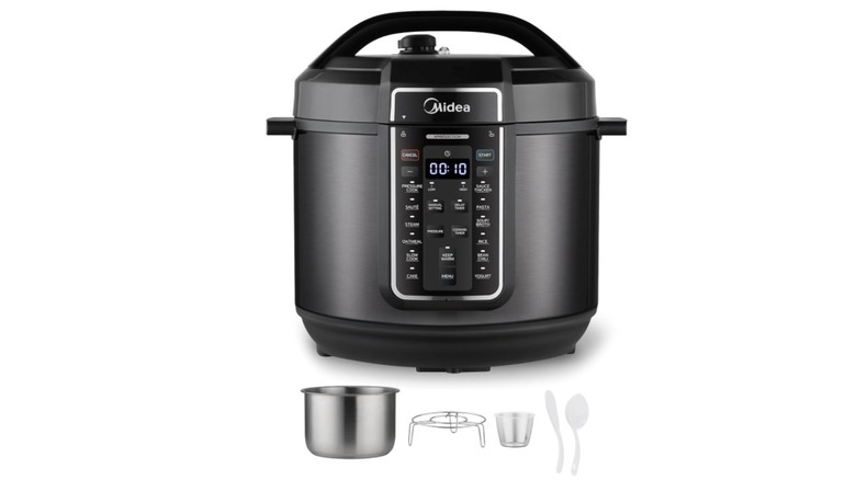 A Midea pressure cooker with its accessories on a white background