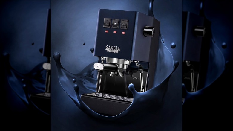 Blue Gaggia Classic machine against navy blue background