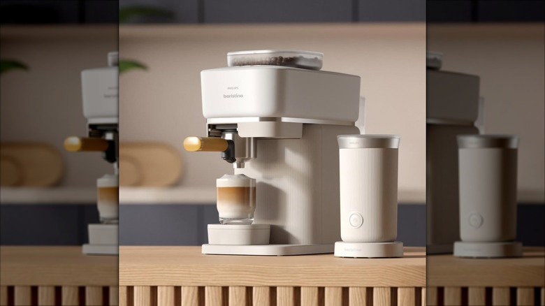 White Philips Baristina with full coffee grinder sitting on counter