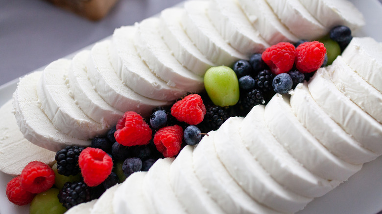 sliced goat cheese with berries