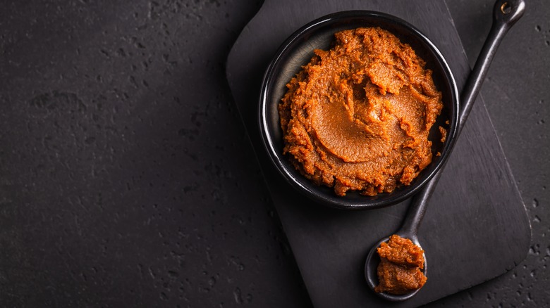 Miso paste in black bowl