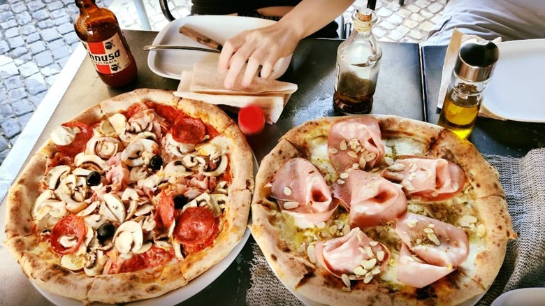 Two pizzas on a table