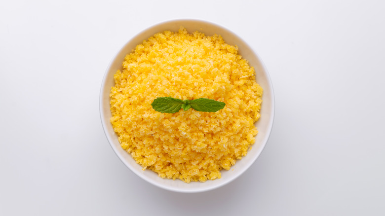 Bowl of couscous white background